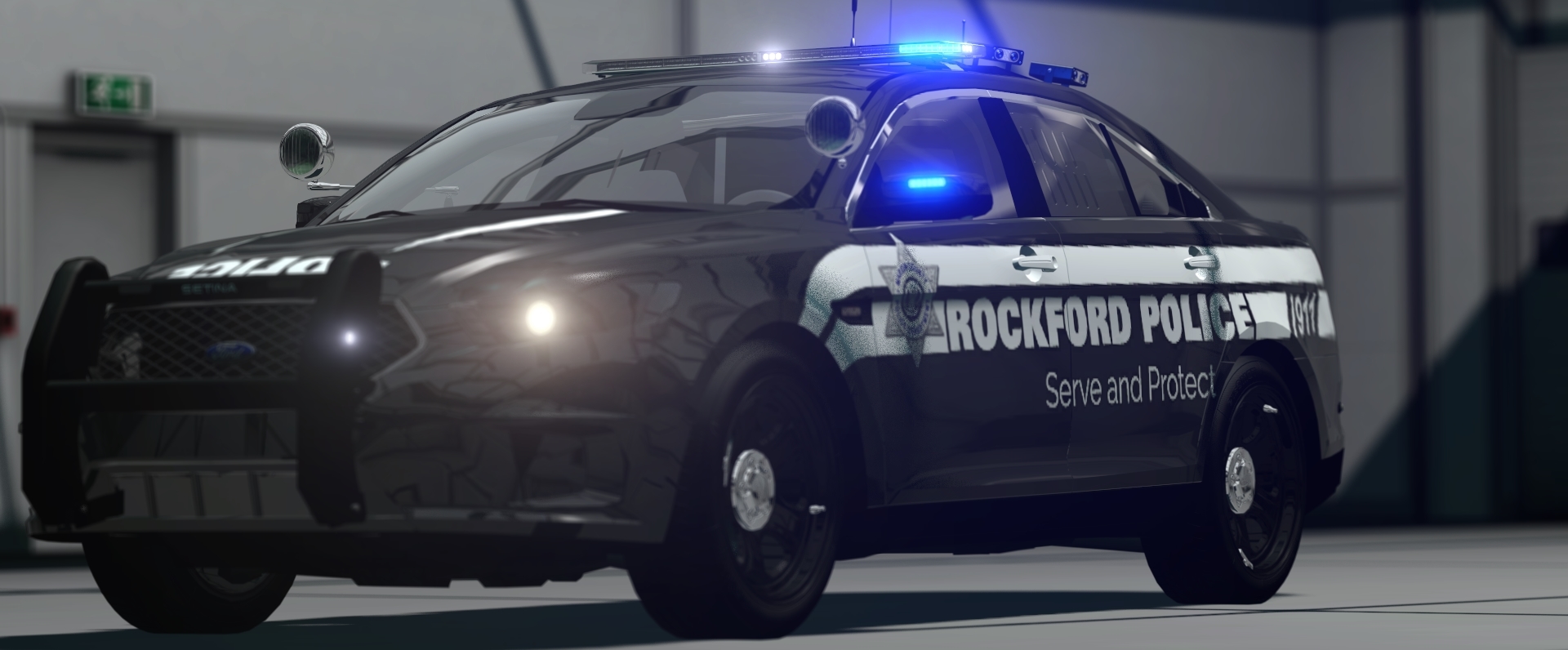 A 2013 Taurus with Rockford Police Livery.